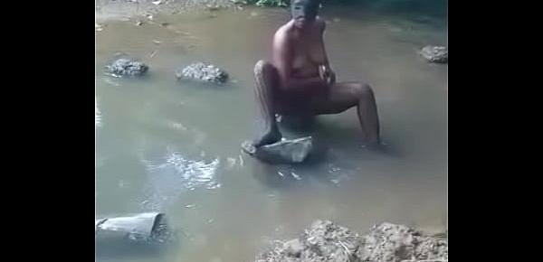  hot african woman taking bath